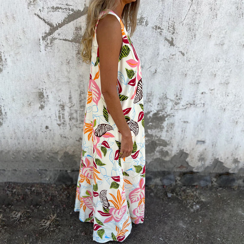 YLVA I MAXIKLEID MIT V-AUSSCHNITT