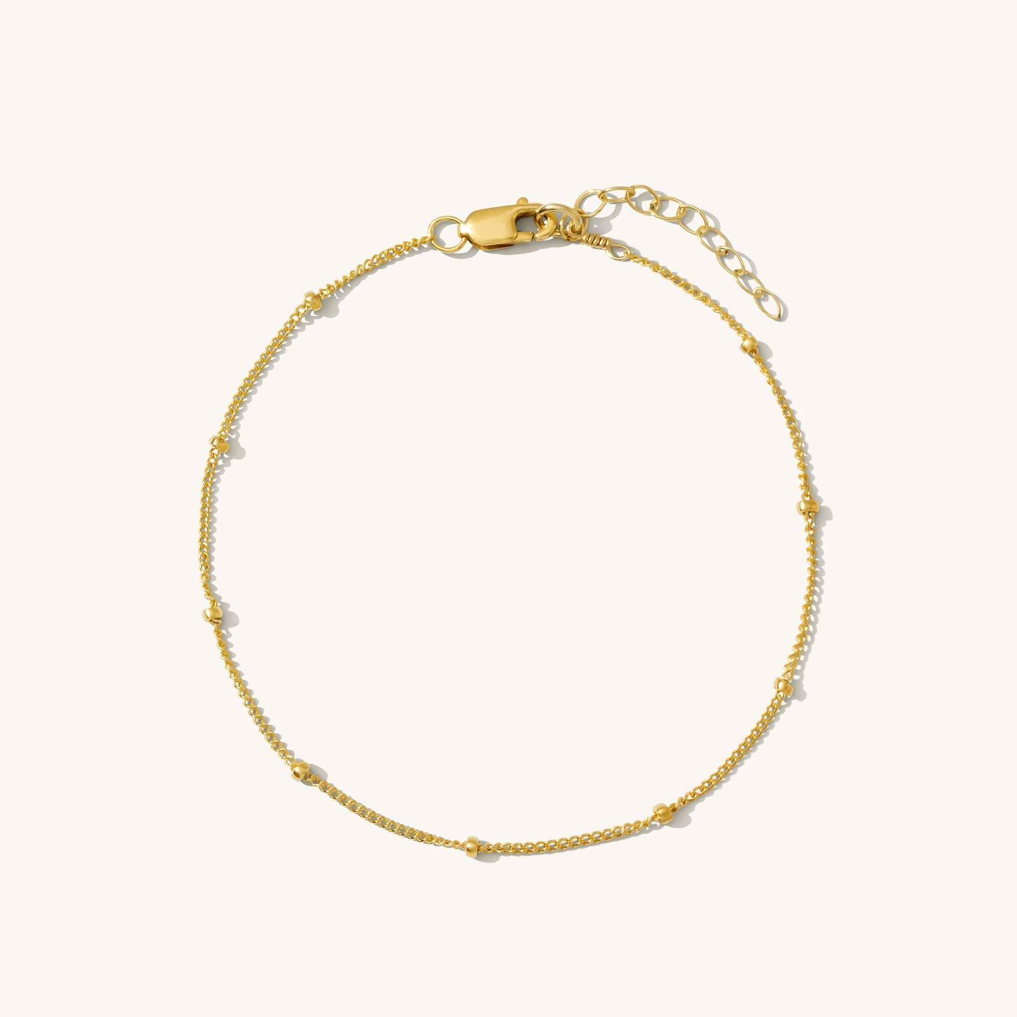 Zarte Armbanduhr mit Satellitenkette