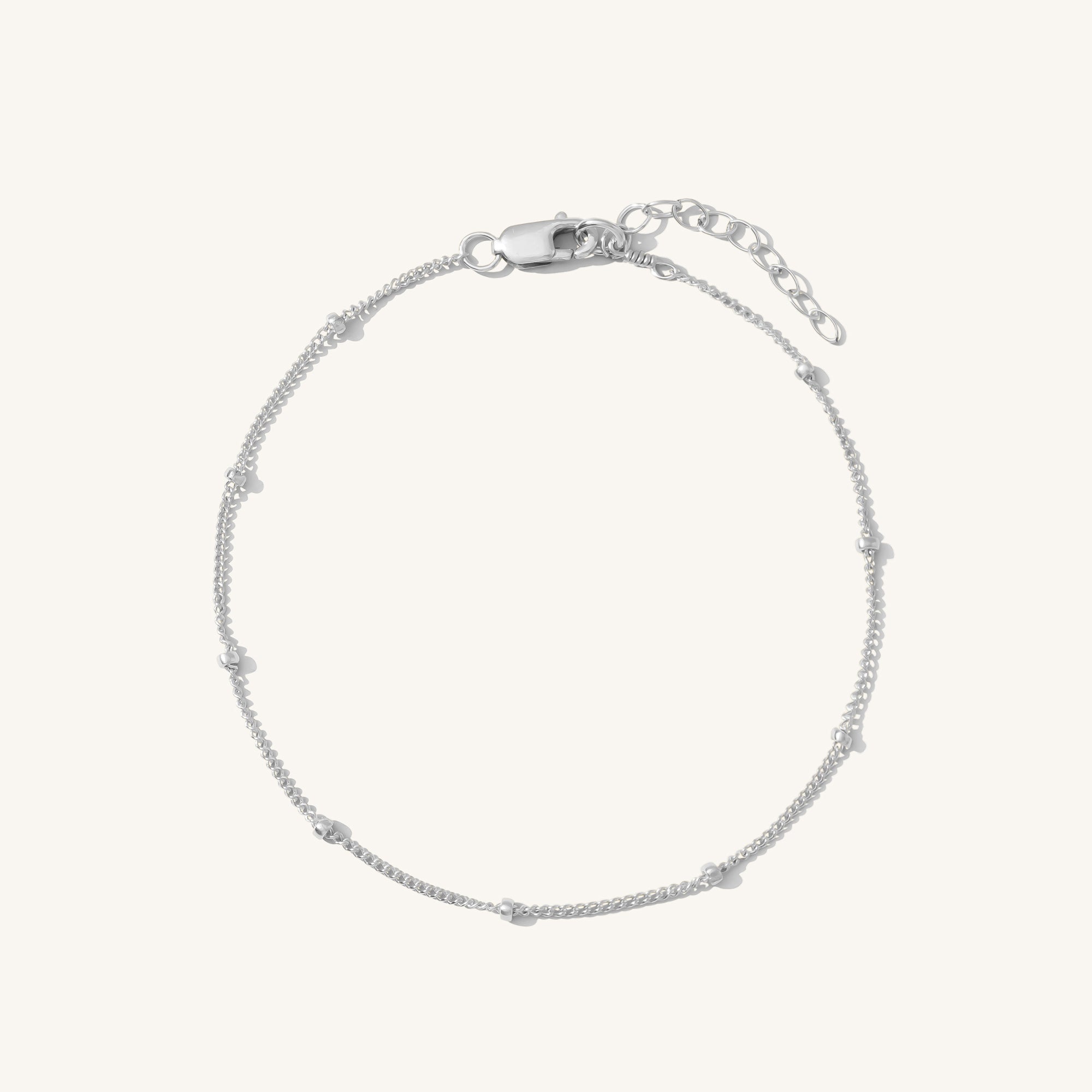Zarte Armbanduhr mit Satellitenkette